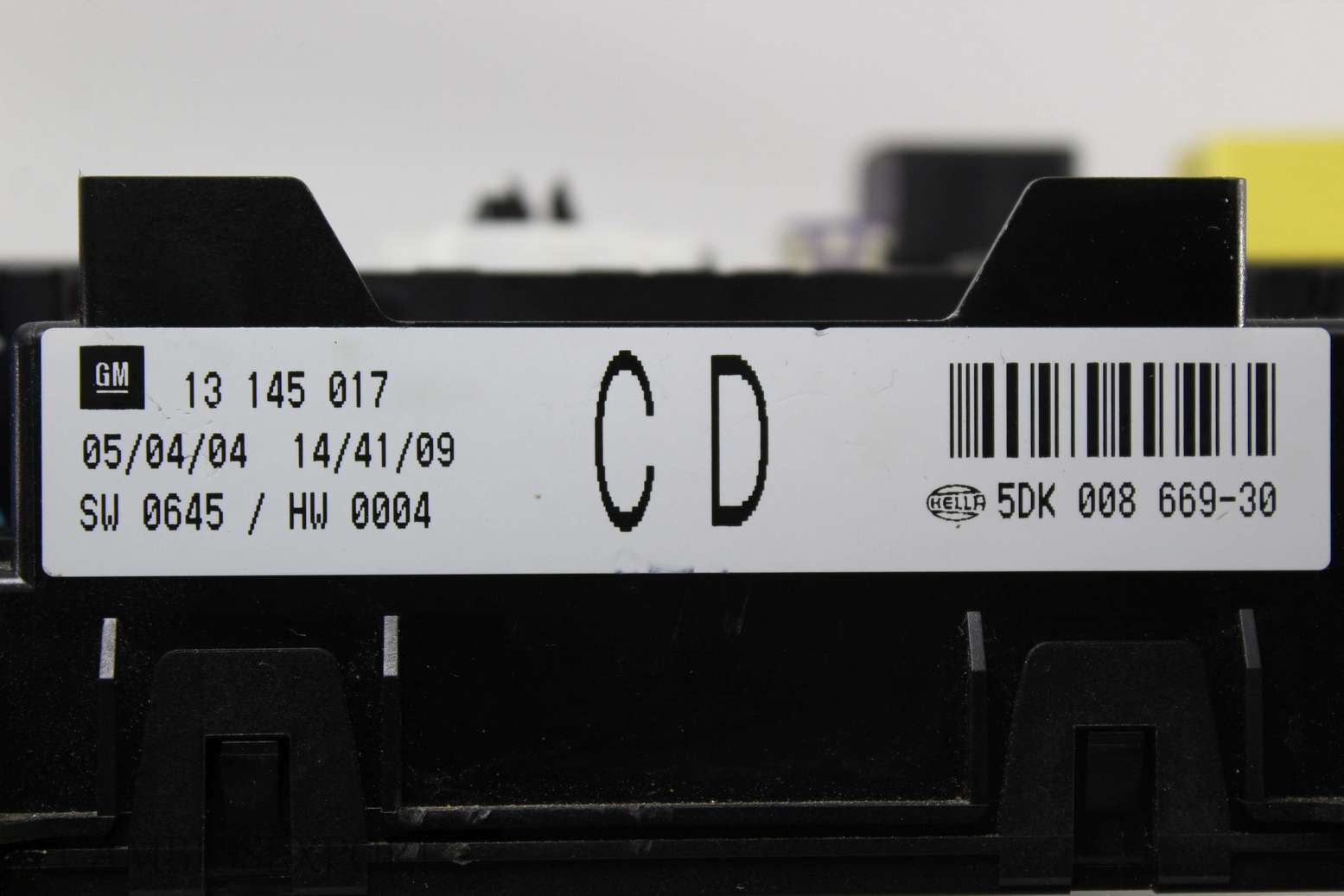 Caja de fusibles Opel Astra 13145017 13145017CD 13 145 017 CD Hella 5DK00866930 5DK 008 669-30 - foto 2